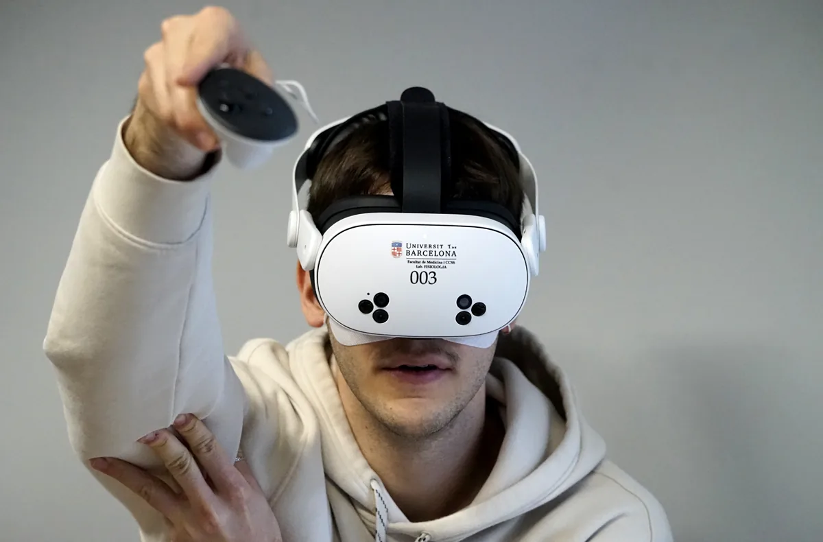 A student interacting with the VR simulation, controller in hand